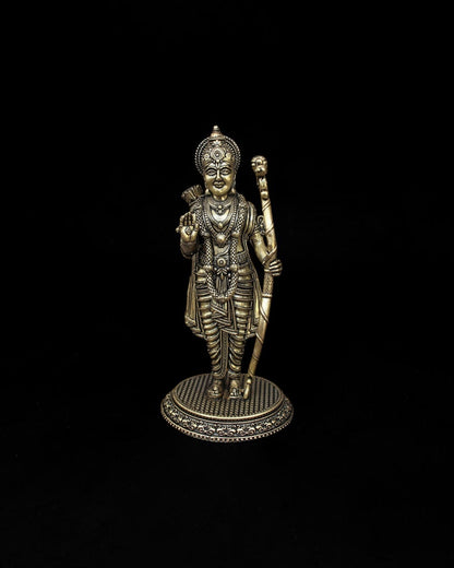 Rigvedaa™ handcrafted brass Lord Rama statue with intricate crown and bow details on a textured circular pedestal