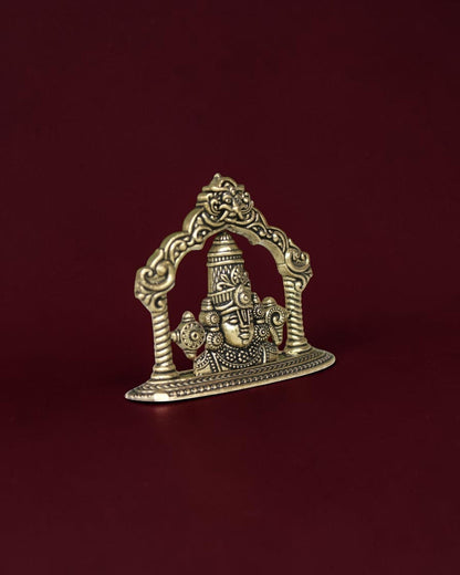 Rigvedaa™ brass Lord Venkateswara Tirupati Balaji face idol with intricate crown and 2D relief design on dark background