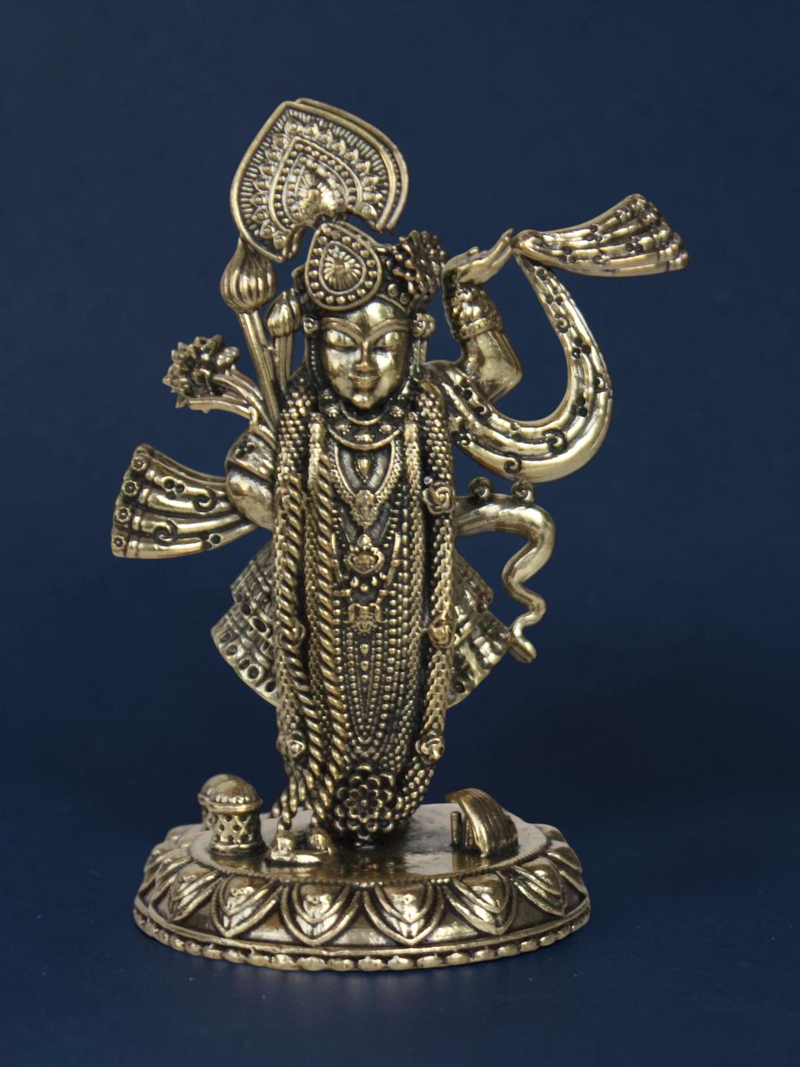 Rigvedaa™ decorative brass Lord Vishnu idol with an antique gold finish and intricate traditional ornamentation.