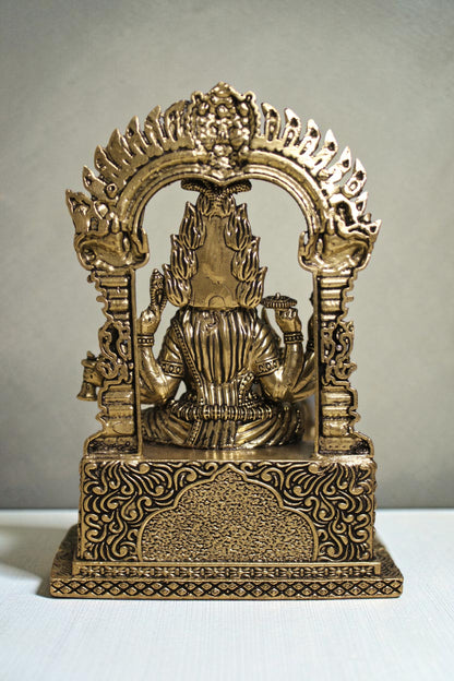 Rigvedaa™ brass idol of Goddess Mariamman in seated pose, adorned with ornaments, 6-inch, for home altars.