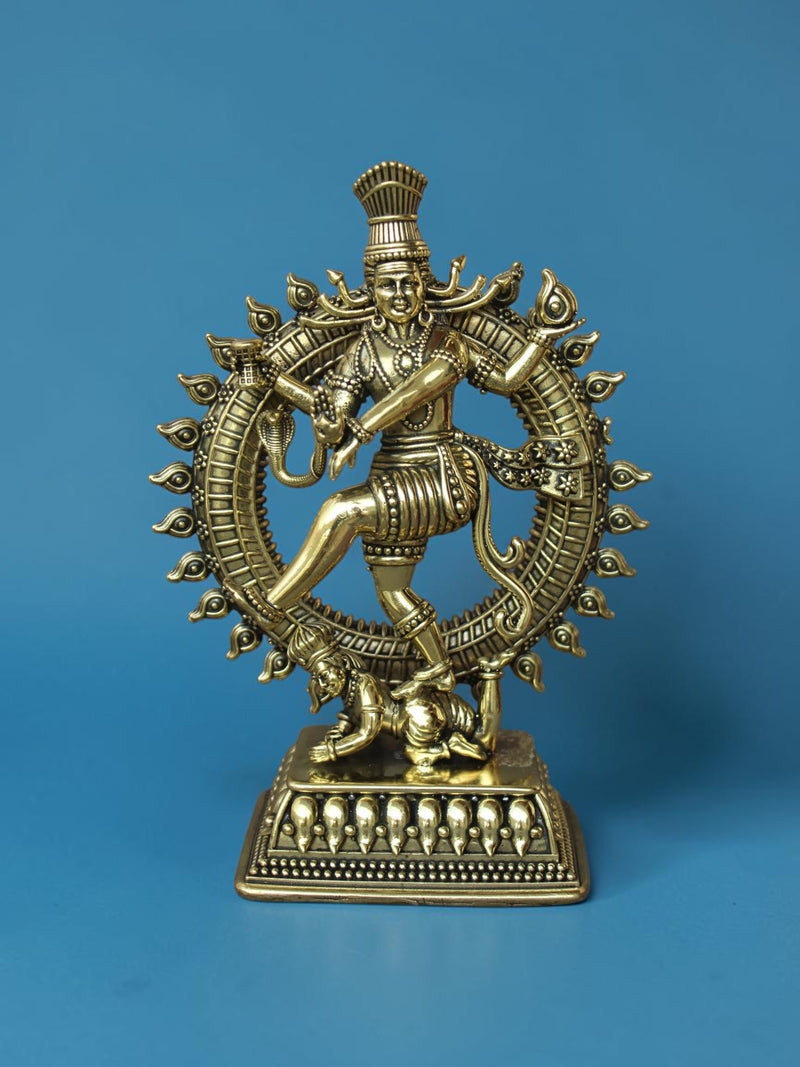 Rigvedaa™ golden brass Nataraja statue featuring Lord Shiva in a cosmic dance with intricate prabhamandala detailing.