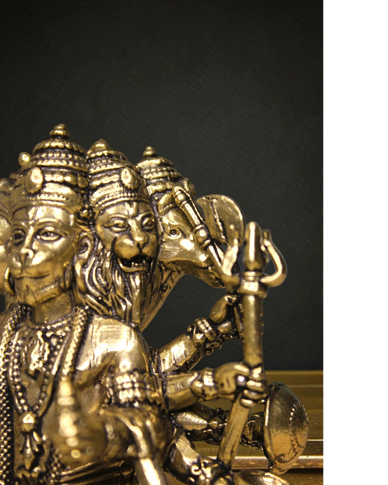 Rigvedaa brass Panchmukhi Balaji idol, a five-faced Hanuman statue in a sitting posture, holding a mace and shield.