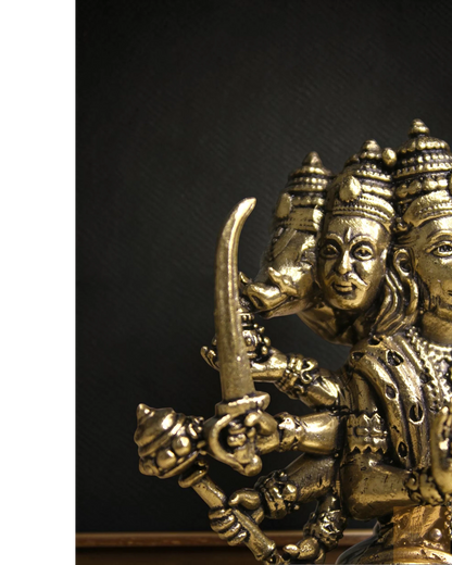 Rigvedaa™ brass Panchmukhi Balaji idol, five-faced Hanuman statue in sitting pose, holding a sword and mace.