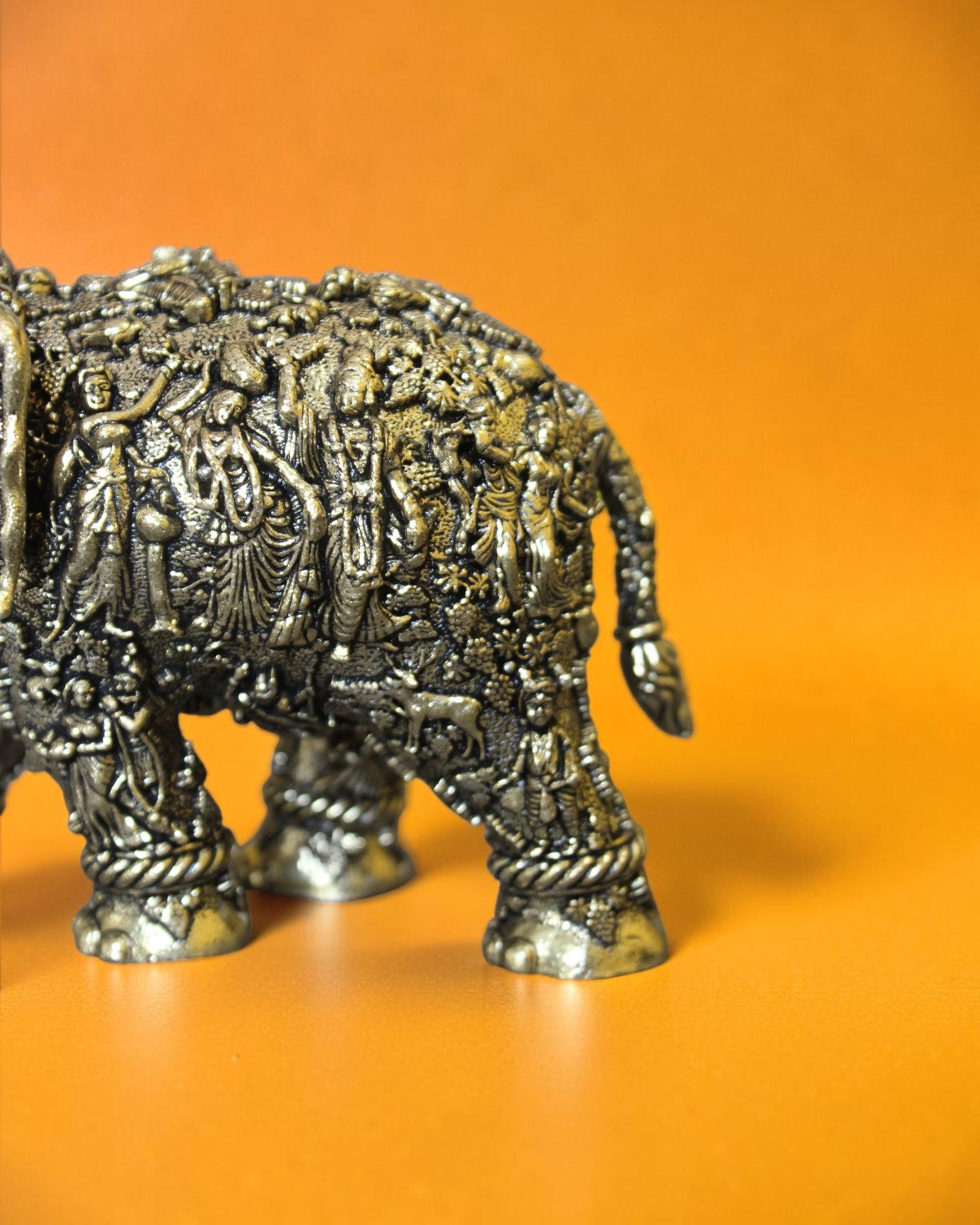 Rigvedaa™ brass elephant statue with Radha Krishna murals, intricate antique engravings, and detailed royal trappings.