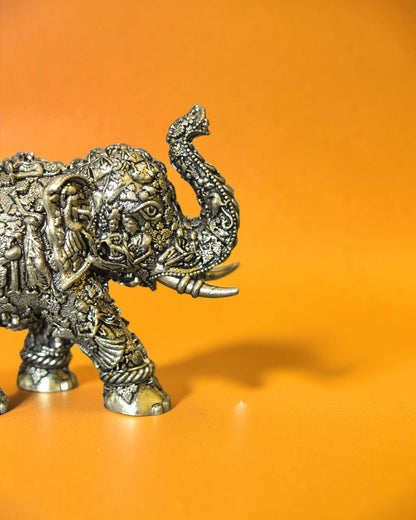 Rigvedaa™ brass elephant statue with intricate Radha Krishna murals and antique finish. Decorative Hathi for puja and home decor.