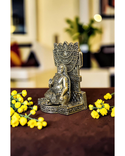 Rigvedaa™ brass idol of Raghavendra Swamy in seated posture with intricate detailing, for home temple puja.