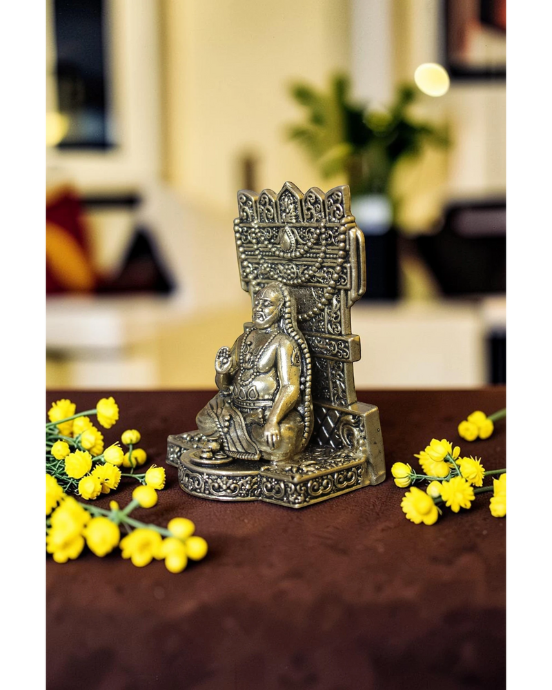 Rigvedaa™ brass idol of Raghavendra Swamy in seated posture with intricate detailing, for home temple puja.