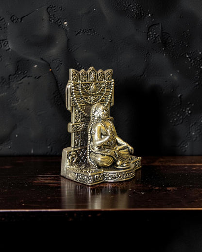 Rigvedaa™ Brass Raghavendra Swamy idol in seated posture with intricate detailing, adorned with beaded necklaces. Ideal for puja rooms.