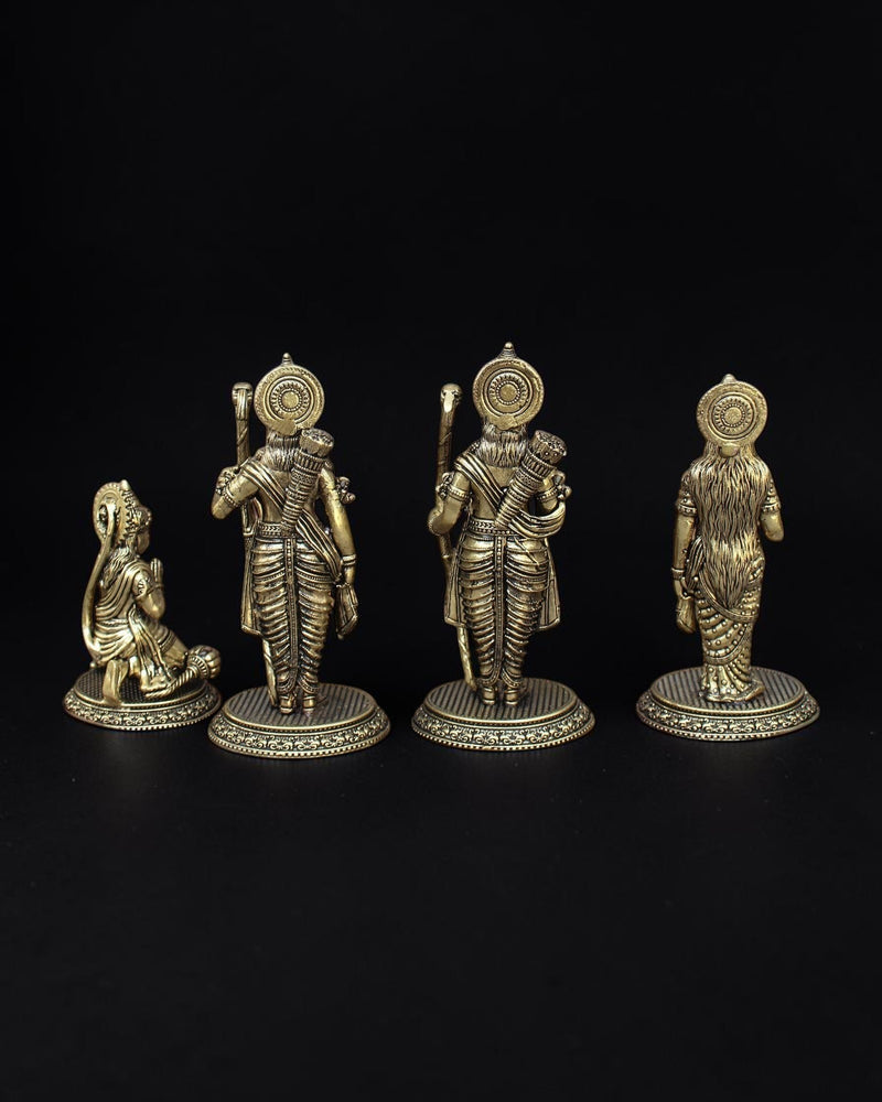 Back view of Rigvedaa™ brass Ram Darbar statue set featuring Rama, Sita, Lakshmana, and Hanuman on circular pedestals.