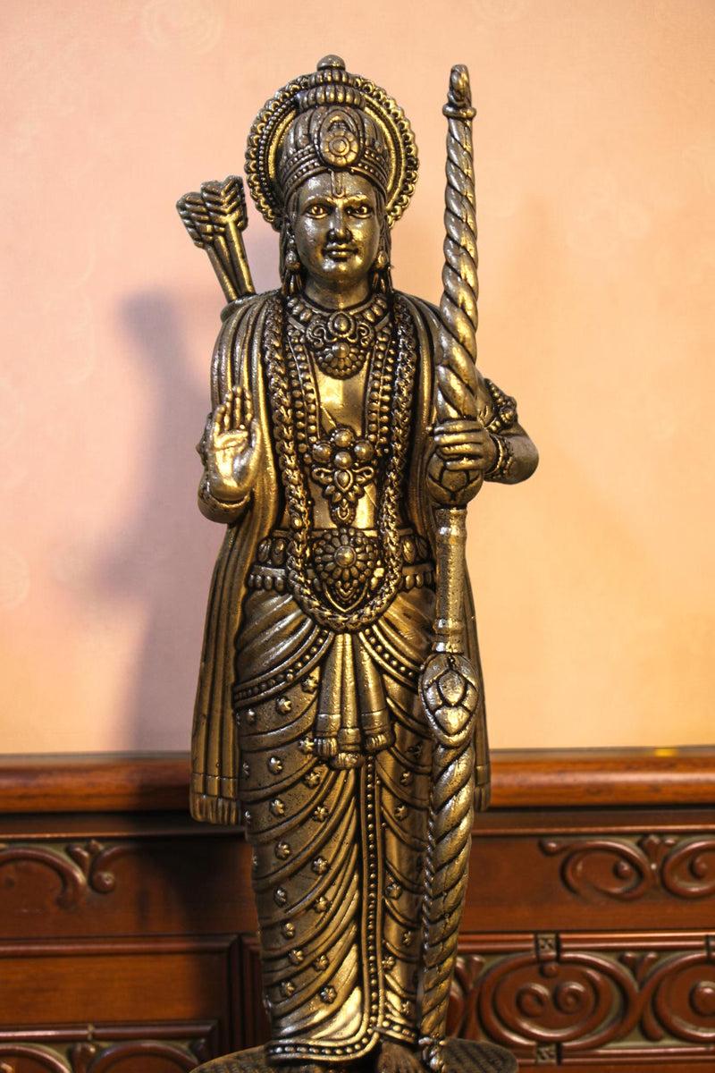Rigvedaa™ antique brass Ram Darbar idol set featuring Lord Ram, Sita, Lakshman, and Hanuman. Intricately detailed with bow and staff.