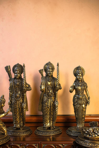Rigvedaa™ antique brass Ram Darbar idol set featuring Lord Ram, Sita, Lakshman, and Hanuman in detailed poses with bows and offerings.