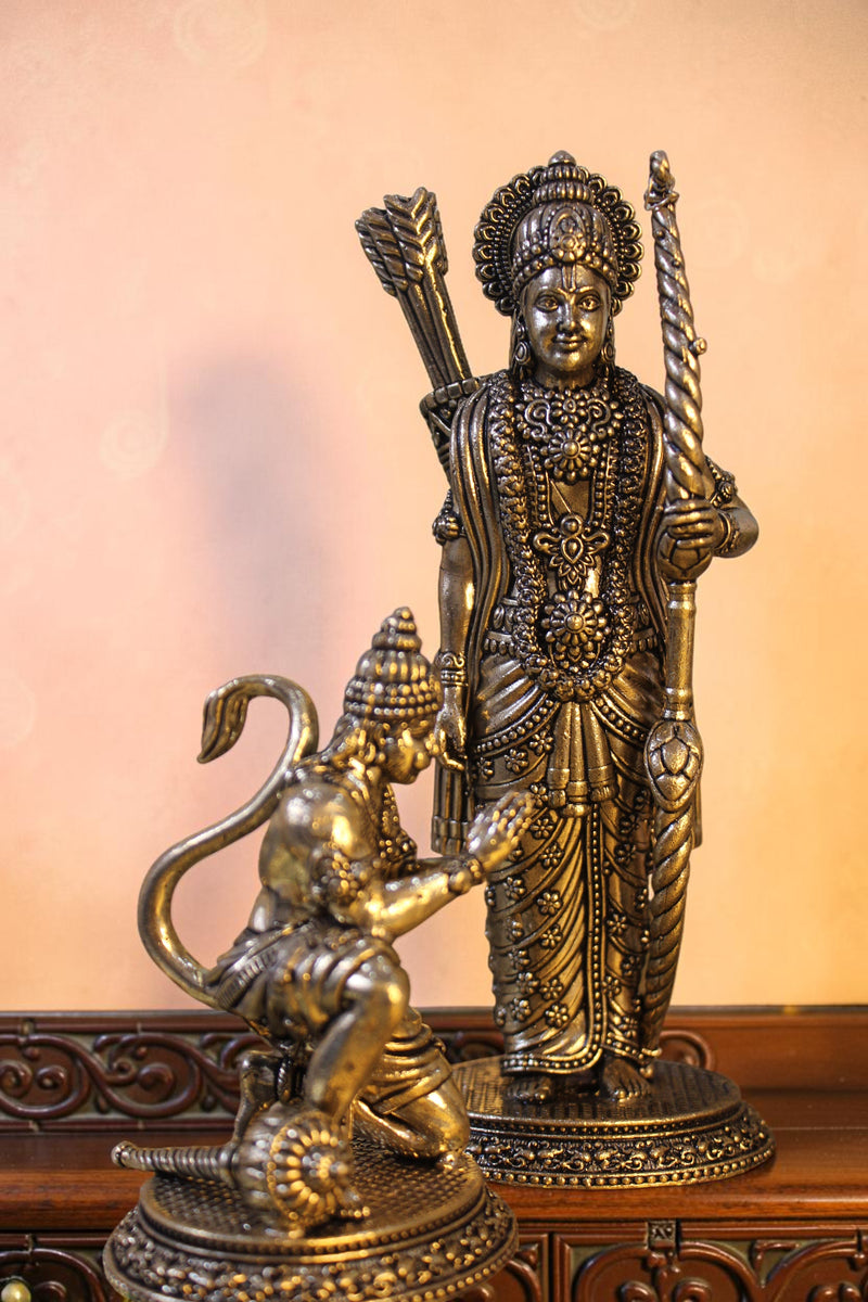 Rigvedaa™ antique brass Ram Darbar idol set with Ram, Sita, Lakshman, and Hanuman. Ram holds a bow, Hanuman kneels.