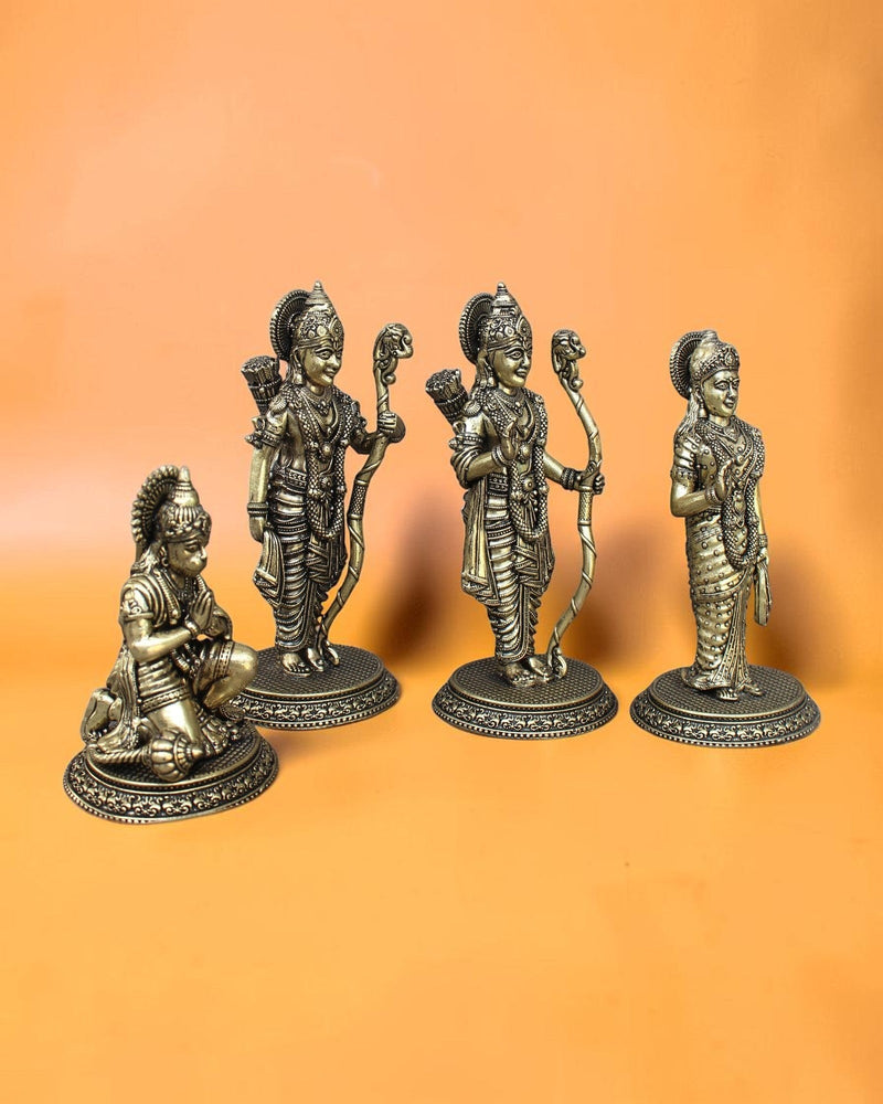 Rigvedaa™ Brass Ram Darbar statue set featuring Lord Rama with bow, Sita, Lakshmana, and Hanuman kneeling. Golden patina.