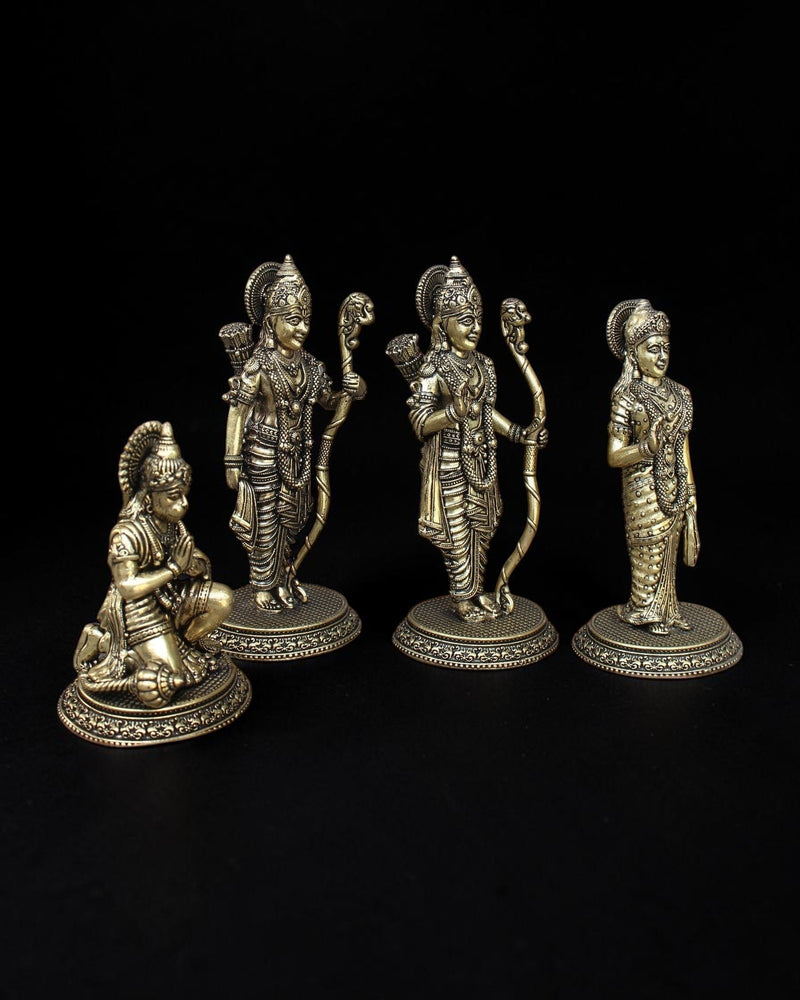 Rigvedaa™ brass Ram Darbar statue set featuring Rama, Sita, Lakshmana, and Hanuman with intricate golden detailing.