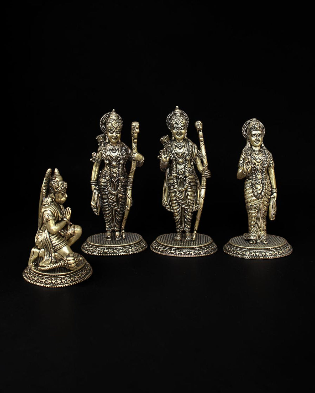 Rigvedaa™ brass Ram Darbar statue set featuring Lord Rama, Sita, Lakshmana, and Hanuman with intricate golden detailing.