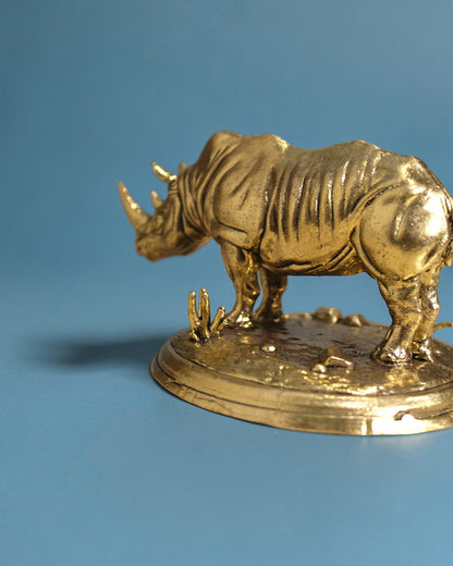 Rigvedaa™ Brass rhinoceros statue, 3.25-inch, detailed, golden patina, for Vastu and Feng Shui protection and wealth.