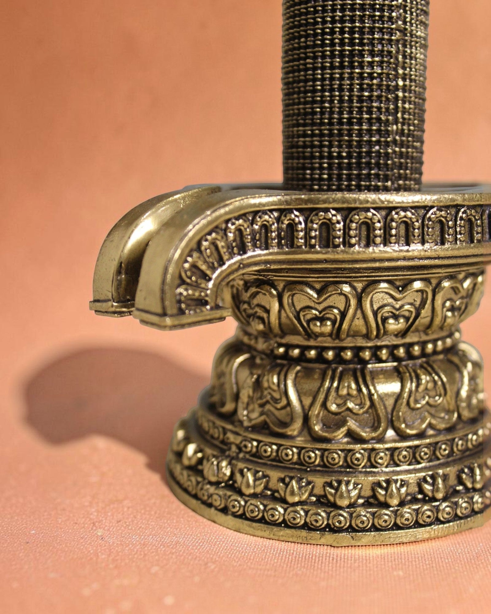Rigvedaa brass 1008 lingam shivling murti with ornate base, intricate carvings, and golden finish. Ideal for pooja rooms.