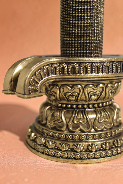 Rigvedaa brass 1008 lingam shivling murti with ornate base, intricate carvings, and golden finish. Ideal for pooja rooms.