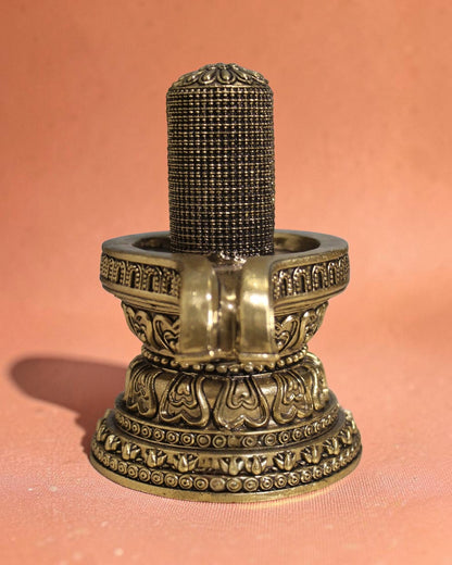Rigvedaa brass 1008 lingam shivling murti with intricate carvings on ornate base, 4.50 inches, for pooja room or meditation space.