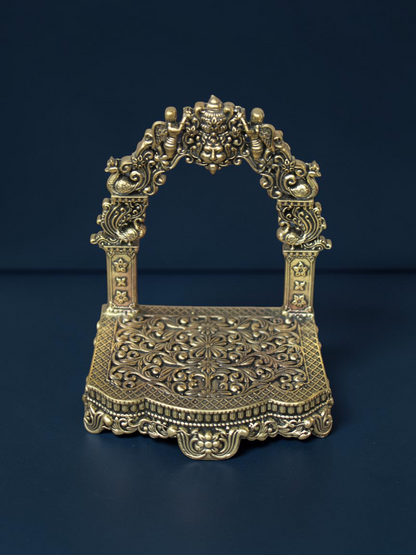 Rigvedaa™ brass Singhasan throne with ornate Prabhavali arch and intricate floral carvings for deity idols