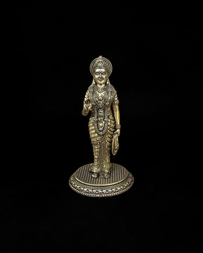 Rigvedaa™ handcrafted brass statue of Goddess Sita standing on a circular pedestal with intricate traditional detailing.