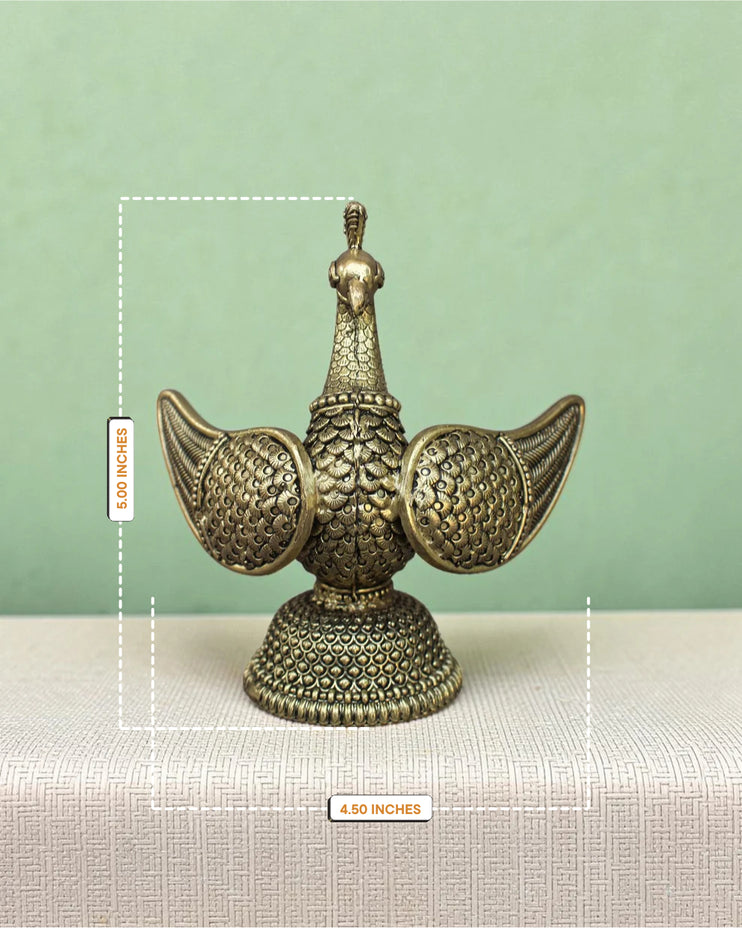 Rigvedaa™ handcrafted brass swan statue featuring intricate fan-shaped carved wings and a warm golden patina finish.