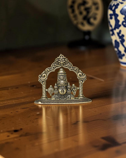Rigvedaa brass Tirupati Balaji face idol with ornate crown and detailed ornaments, 2.00 inch.