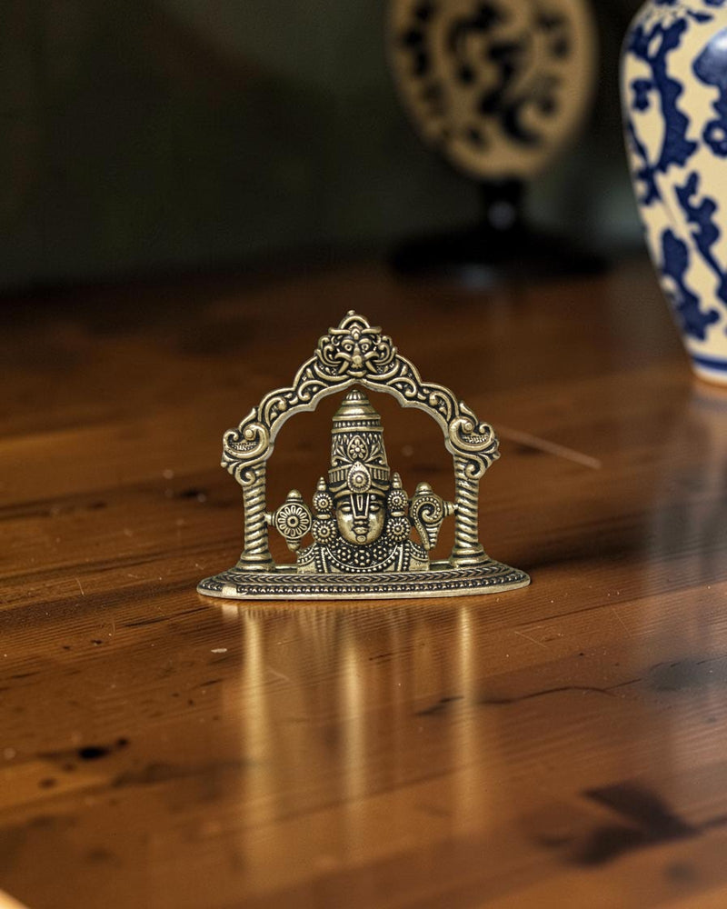 Rigvedaa brass Tirupati Balaji face idol with ornate crown and detailed ornaments, 2.00 inch.