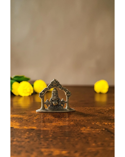 Rigvedaa brass Tirupati Balaji face murti with ornate crown and detailed ornaments, ideal for home mandir and gifting.