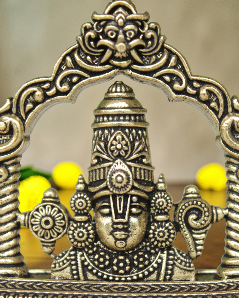 Rigvedaa brass Tirupati Balaji face murti with ornate crown and detailed ornaments, ideal for home mandir and gifting.