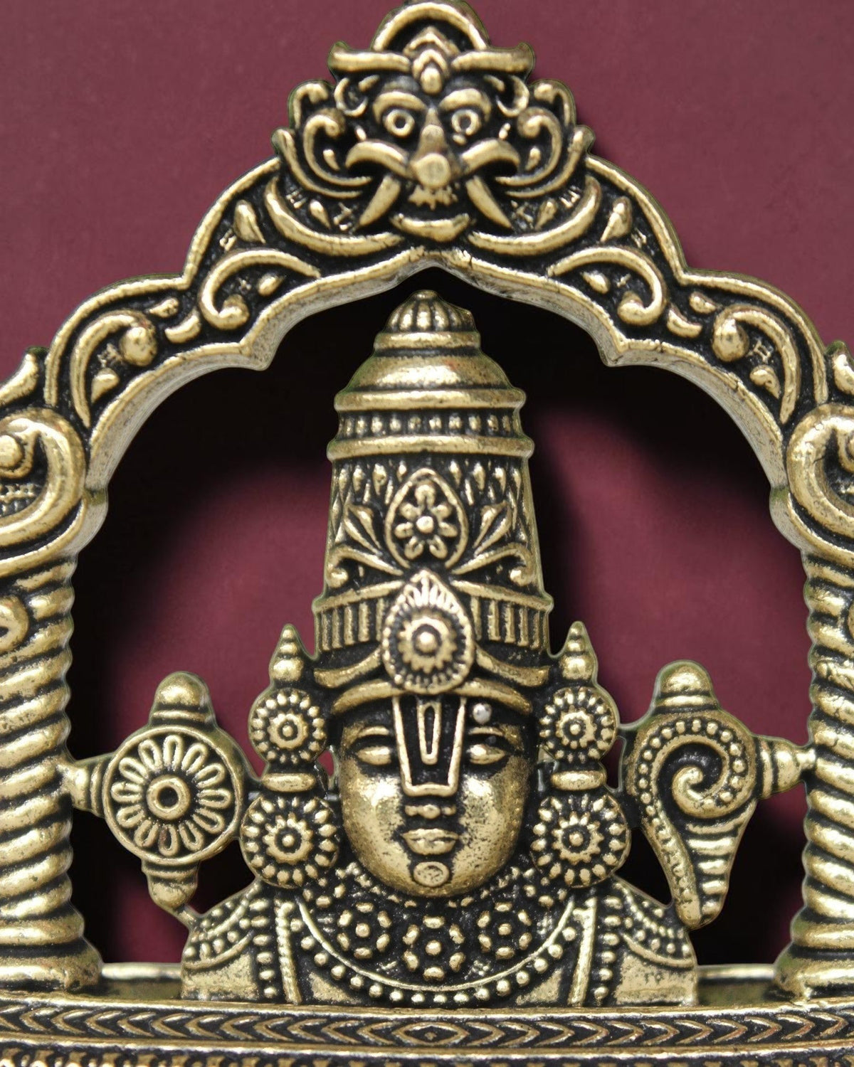 Rigvedaa™ 2-inch brass Lord Venkateswara Tirupati Balaji face idol with intricate crown and traditional relief detailing.
