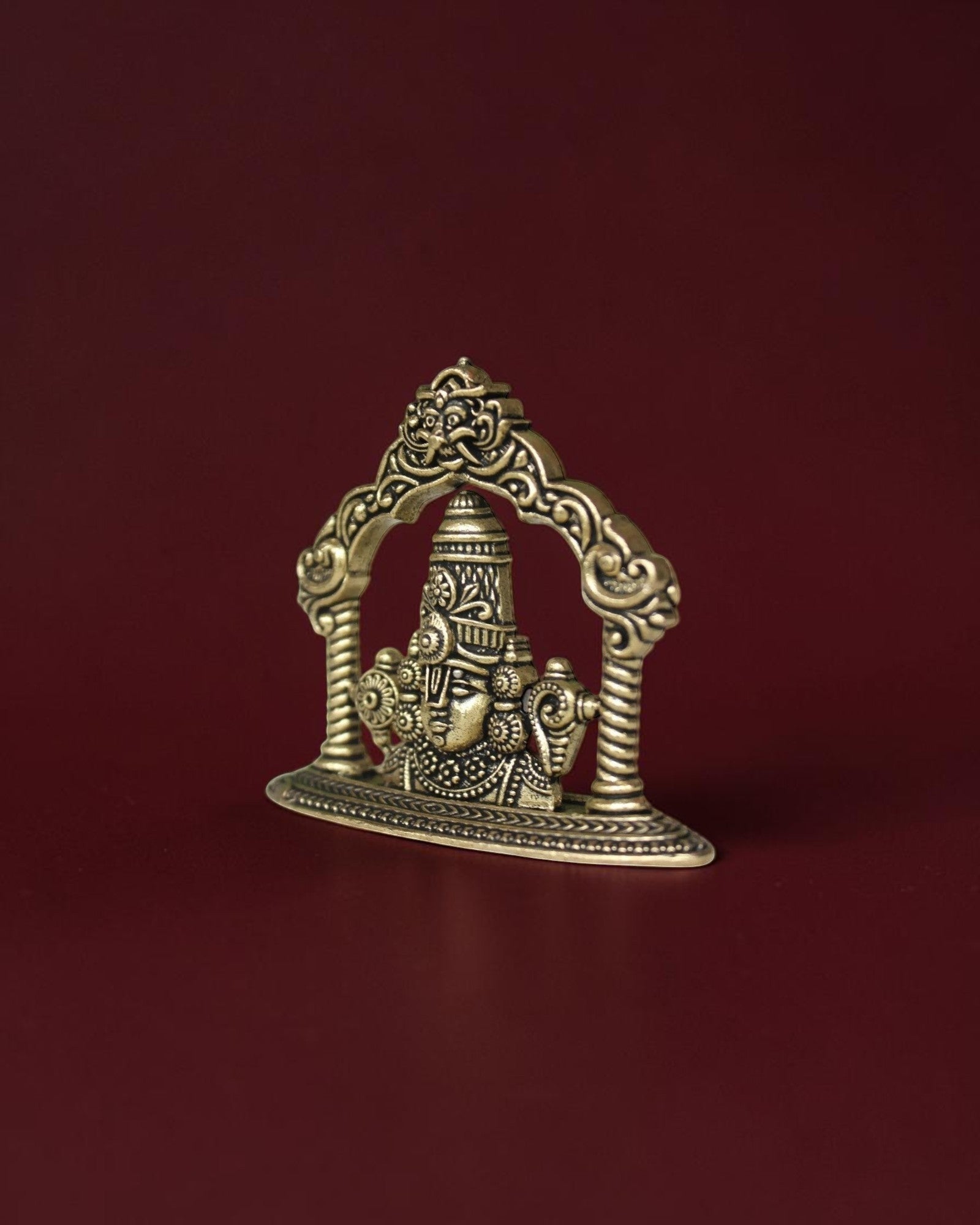 Rigvedaa™ brass Tirupati Balaji face idol with intricate crown detailing for home mandir or car dashboard