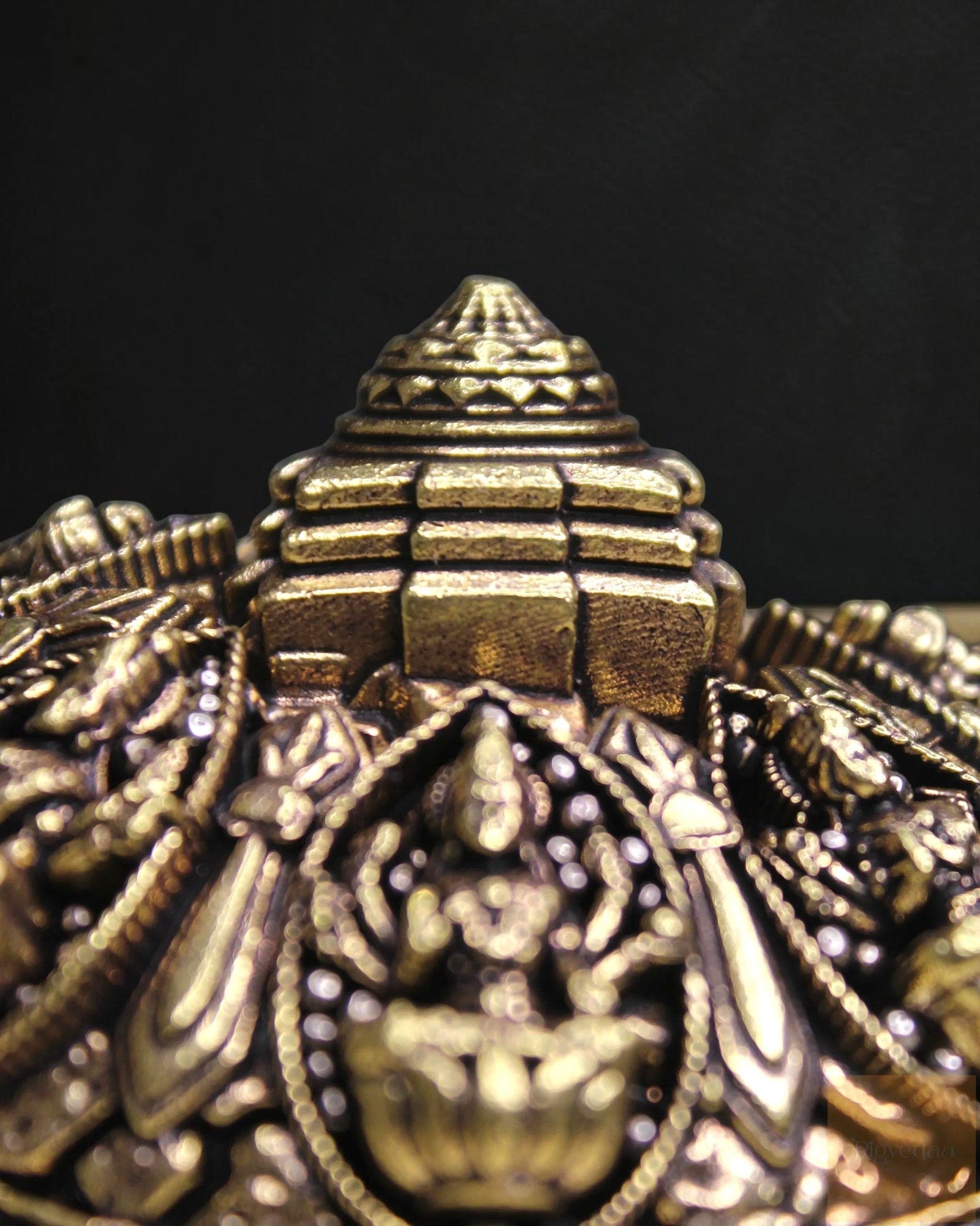 Rigvedaa brass tortoise with intricate Ashta Lakshmi and Shree Yantra engraving, a Vastu Feng Shui remedy for prosperity.