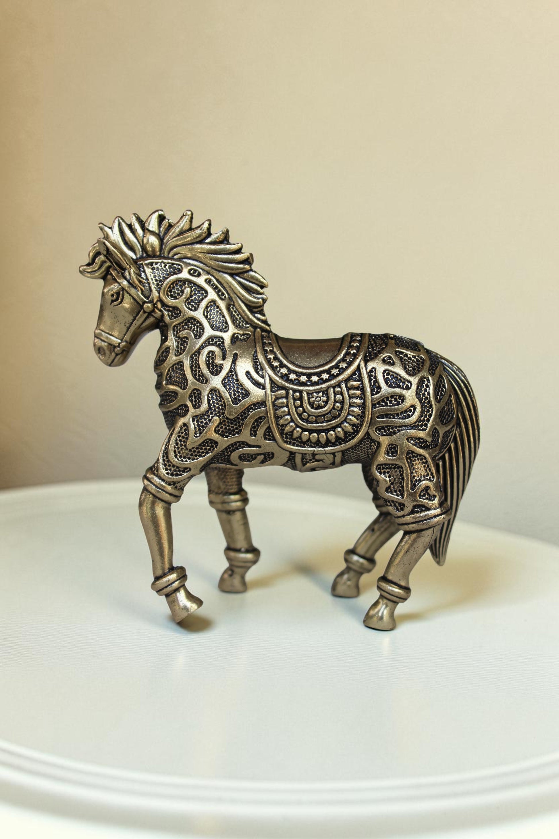Rigvedaa™ brass Vastu horse sculpture with intricate detailing, symbolizing success and prosperity. Golden finish.