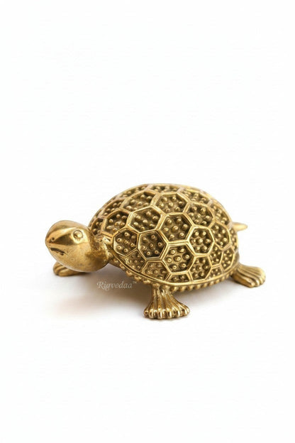 Rigvedaa brass Vastu tortoise figurine with intricate honeycomb pattern on shell, symbol of wealth and protection.