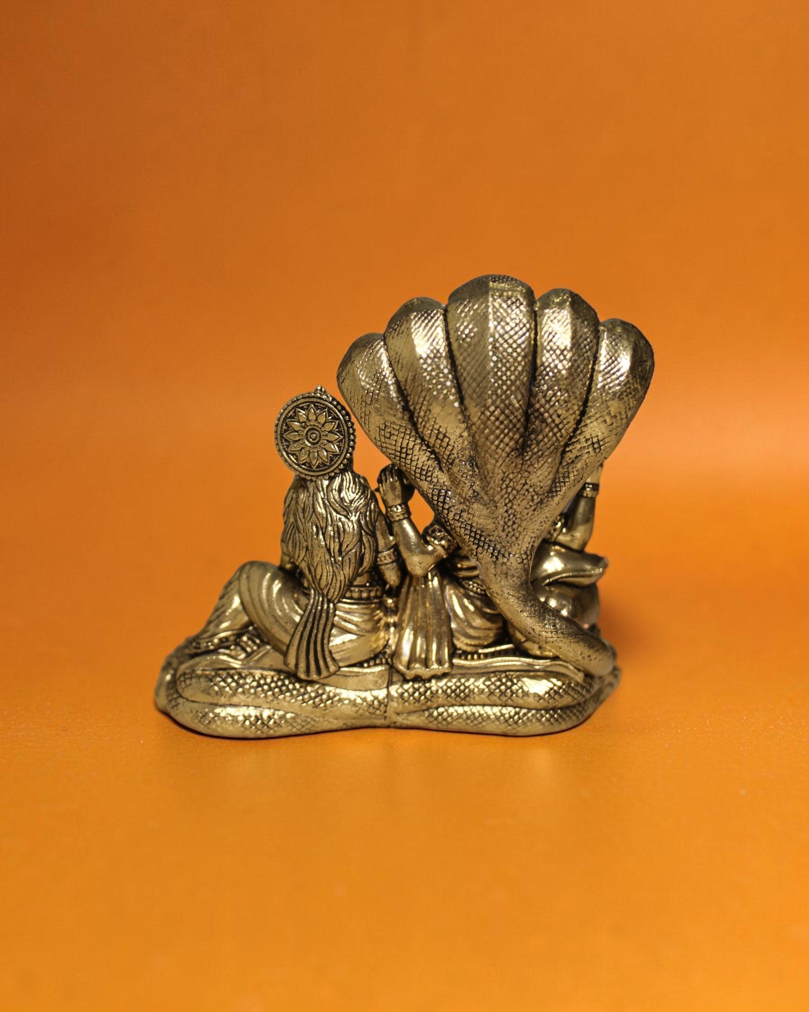 Rigvedaa Brass Vishnu Lakshmi Sheshnag statue, golden patina, intricate details, 4.25 inches. For wealth and protection.