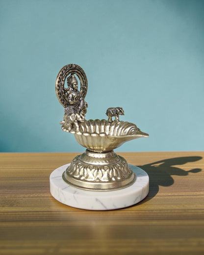 Rigvedaa™ Handcrafted brass Gaj Laxmi diya oil lamp with intricate details and antique finish, 4.5 inches.