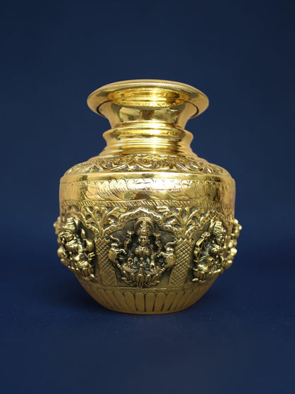 Rigvedaa™ handcrafted brass kalash pot with polished gold finish and intricate embossed deity carvings