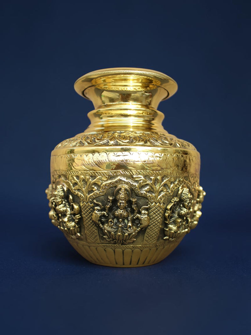 Rigvedaa™ handcrafted brass kalash pot with polished gold finish and intricate embossed deity carvings