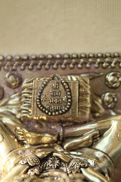 Rigvedaa brass idol of Lord Hanuman meditating, seated in Ram Sadhna posture, with intricate detailing and golden finish.