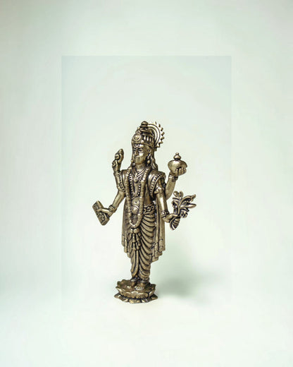 Rigvedaa Lord Dhanvantri brass idol, God of Ayurveda, holding a pot and herbs, for health and healing.