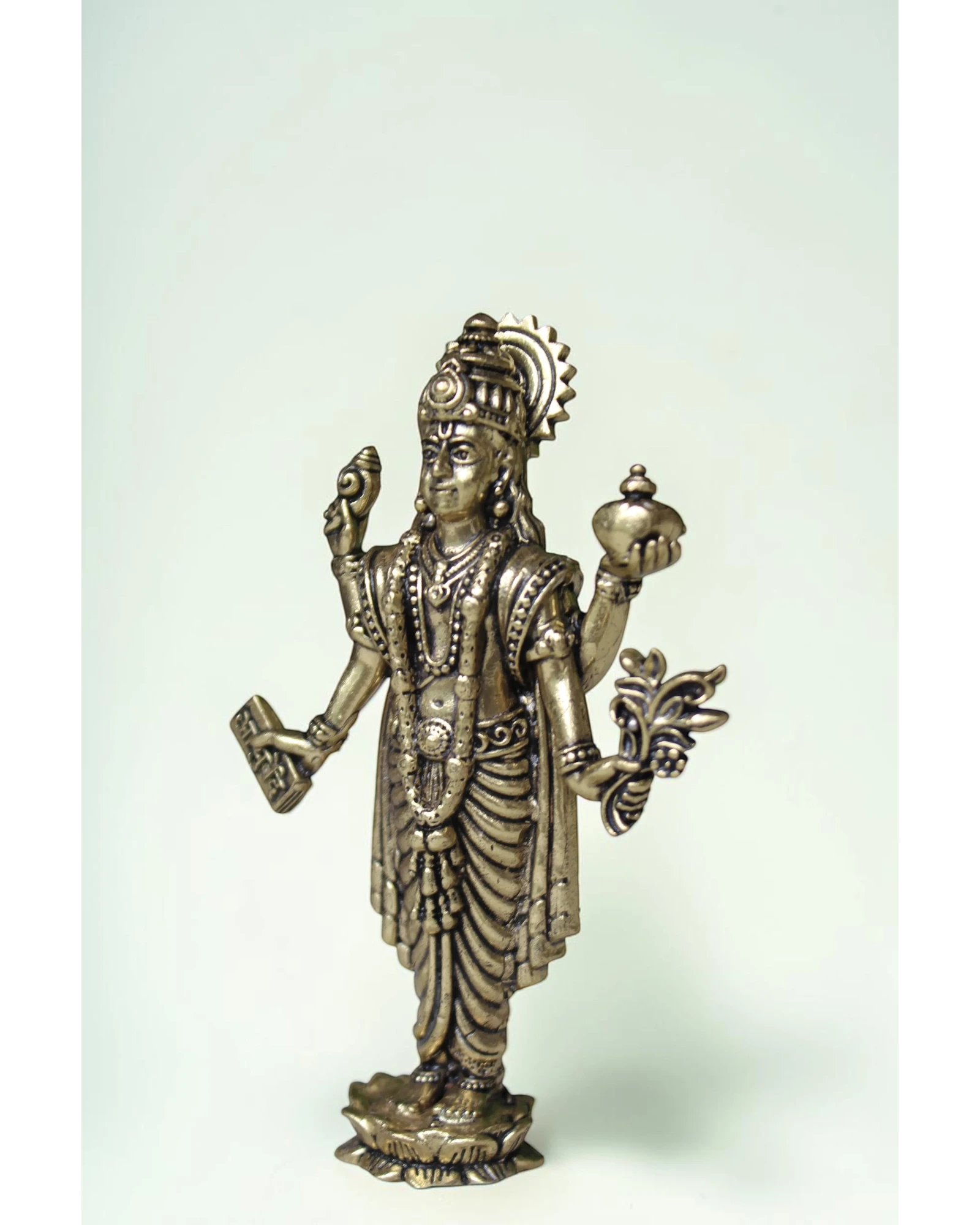 Rigvedaa Lord Dhanvantri brass idol, God of Ayurveda, holding a pot and herbs, for health and healing.