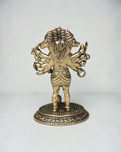 Rigvedaa Panchmukhi Balaji idol, a five-faced brass sculpture with antique finish, intricate detailing, and multiple arms, standing on an ornate base.