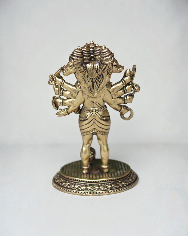 Rigvedaa Panchmukhi Balaji idol, a five-faced brass sculpture with antique finish, intricate detailing, and multiple arms, standing on an ornate base.