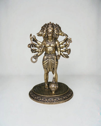Rigvedaa Standing Panchmukhi Balaji idol in antique brass, five-faced sculpture with multiple arms holding divine weapons, intricate detailing.