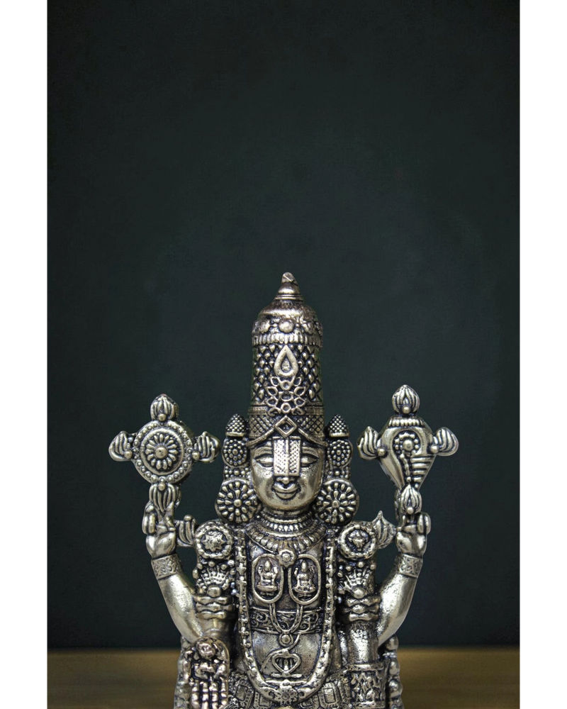 Close-up of Tirupati Balaji brass idol face and Kireedam crown with Chakra and Shankha – intricate detailing on pure brass Lord Venkateshwara statue