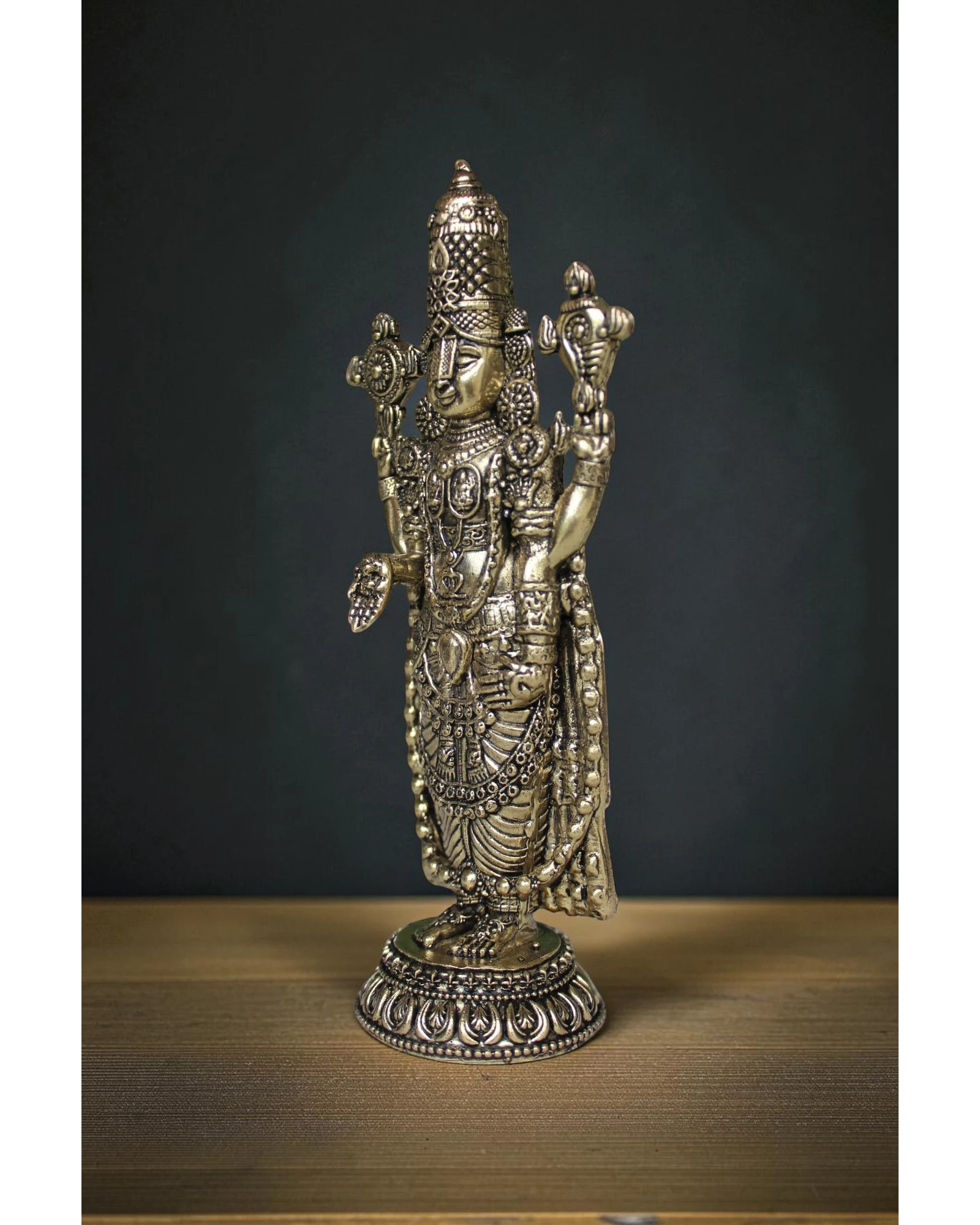 Side angle view of Tirupati Balaji brass idol showing intricate jewellery and divine attire – pure brass Lord Venkateshwara murti for home temple